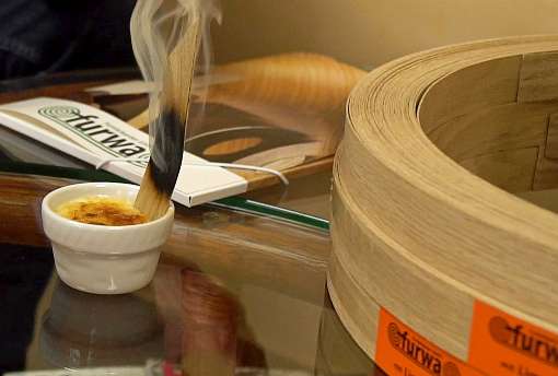 FURWA’s Limartec thick veneer edge banding is flame resistant and is therefore suitable for many different uses. In fire tests, it chars and extinguishes immediately. Photo: IFN/FURWA Furnierkanten GmbH