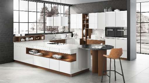 Image 2: Clear shapes, glossy lacquered surfaces and lots of wood whet the appetite for a new kitchen. Photo: Arbeitsgemeinschaft Die Moderne Küche e.V. (AMK)